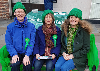 Green Party activists with green hats
